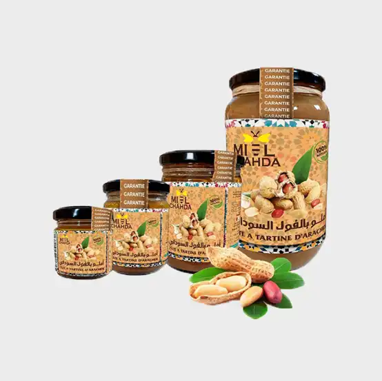 Authentic Moroccan Peanut Amlou – Roasted Peanut, Argan Oil & Honey Spread | Natural Energy Booster Product Description: What is the product? Peanut Amlou is a rich and creamy Moroccan spread made from roasted peanuts, pure argan oil, and fragrant orange blossom honey. This natural, nutrient-dense spread is perfect for a healthy breakfast, a quick energy boost, or a flavorful addition to your favorite recipes. What makes it unique? Unlike commercial peanut butters, Peanut Amlou is 100% natural, made with just three premium ingredients: roasted peanuts, cold-pressed argan oil, and orange blossom honey. It contains no artificial additives, preservatives, or refined sugars, making it a healthier alternative to processed spreads. The combination of argan oil and peanuts gives it a smooth texture, rich taste, and a unique Moroccan touch. What are its key benefits? Natural Energy Booster – Packed with protein, healthy fats, and natural sugars for sustained energy Rich in Antioxidants & Healthy Fats – Argan oil promotes heart health, glowing skin, and brain function Supports Digestion – Contains fiber and healthy oils for gut health Nutrient-Dense & Satisfying – High in vitamins, minerals, and plant-based protein Versatile & Delicious – Can be used as a spread, dip, or smoothie ingredient Who is it for? Health-conscious individuals looking for a nutritious energy booster Athletes and fitness enthusiasts needing a natural pre/post-workout snack Those following vegan, keto, or paleo diets Lovers of traditional Moroccan cuisine Anyone looking for a healthy alternative to processed peanut butter How is it used? Spread on toast, bread, Moroccan pancakes (baghrir & msemen) Stir into yogurt, smoothies, or oatmeal Use as a dip for fruits or crackers Enjoy straight from the spoon for an instant energy boost What is its story? Peanut Amlou is inspired by the centuries-old Berber (Amazigh) tradition of making Amlou, a nourishing paste originally prepared with almonds. This version, made with roasted peanuts, offers a more affordable yet equally delicious alternative while maintaining the rich heritage of Moroccan cuisine. Handcrafted with care, it brings the taste of Morocco’s culinary excellence to kitchens worldwide. Product Attributes: Usage: Use as a spread, mix into smoothies, or enjoy by the spoonful for a quick energy boost. Target Audience: Health-conscious individuals, athletes, vegans, Mediterranean diet followers, and lovers of Moroccan cuisine. Main Benefits: Provides long-lasting energy, rich in antioxidants and healthy fats, supports digestion, and promotes heart and brain health. Precautions: Contains peanuts; may not be suitable for individuals with nut allergies. Store in a cool, dry place and stir before use, as natural oil separation may occur. Formulation: Made from 100% natural roasted peanuts, cold-pressed argan oil, and orange blossom honey. No additives or preservatives. Features: Handmade, non-GMO, preservative-free, gluten-free, keto-friendly, and traditionally crafted in Morocco. Focus Keywords (SEO-Optimized, Comma-Separated): Moroccan peanut amlou, authentic peanut amlou, peanut argan oil honey spread, traditional Moroccan food, healthy peanut butter alternative, natural energy booster, best peanut amlou online, amlou organic spread, peanut amlou for skin and hair, keto-friendly peanut spread, paleo-friendly nut butter, Moroccan superfood paste, handcrafted peanut amlou, healthy breakfast spread, all-natural peanut amlou, high-antioxidant peanut butter, cold-pressed argan oil spread, Moroccan peanut butter, vitamin-rich peanut spread, non-GMO peanut spread, protein-rich energy food, traditional Moroccan cuisine, vegan-friendly peanut spread, gourmet Moroccan food, luxury peanut amlou paste, Moroccan health foods online, peanut amlou for smoothies and toast, authentic Amazigh food, premium Moroccan peanut butter, handmade organic peanut spread
